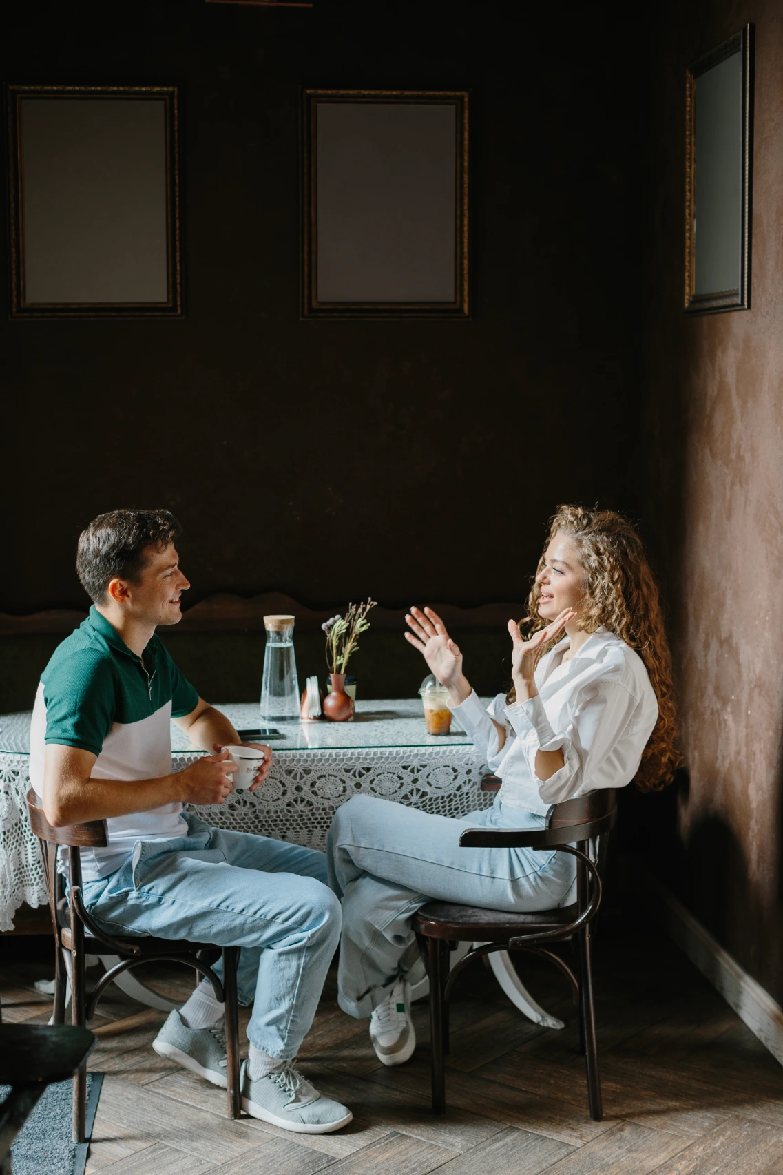 Woman talking to her boyfriend on a coffee date